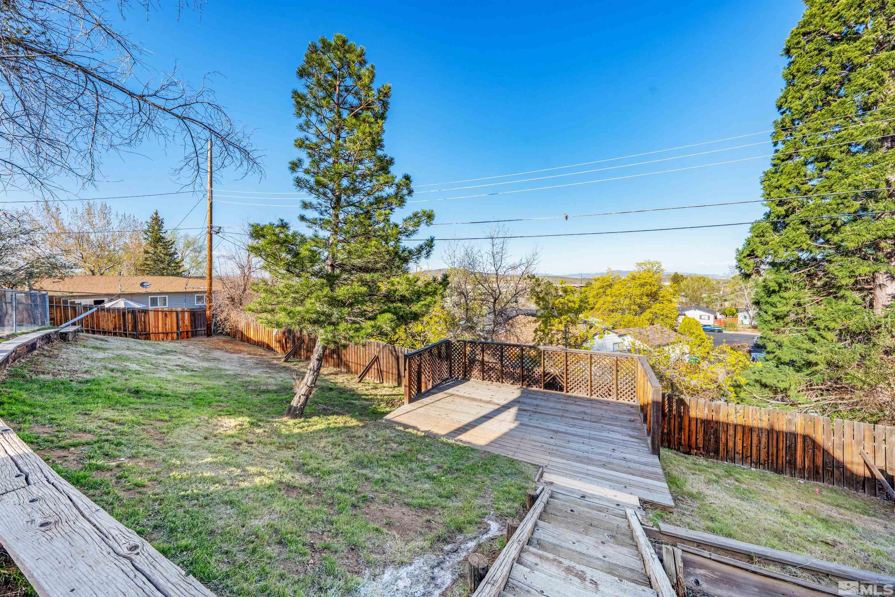 7750 Yorkshire Drive Reno, NV 89506 - Photo 21 of 33 a view of a backyard with sitting area