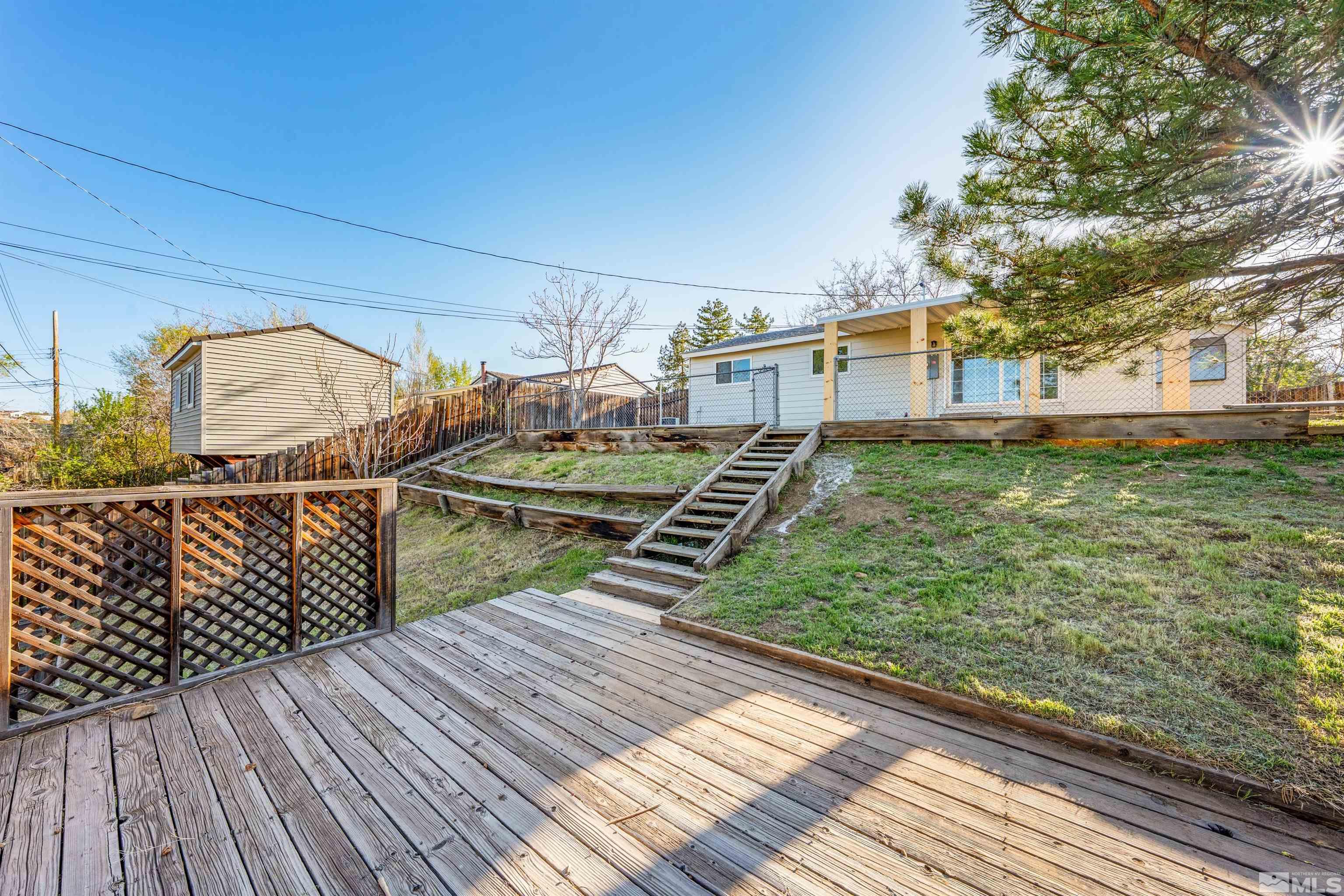7750 Yorkshire Drive Reno, NV 89506 - Photo 23 of 33 a view of a backyard with sitting area