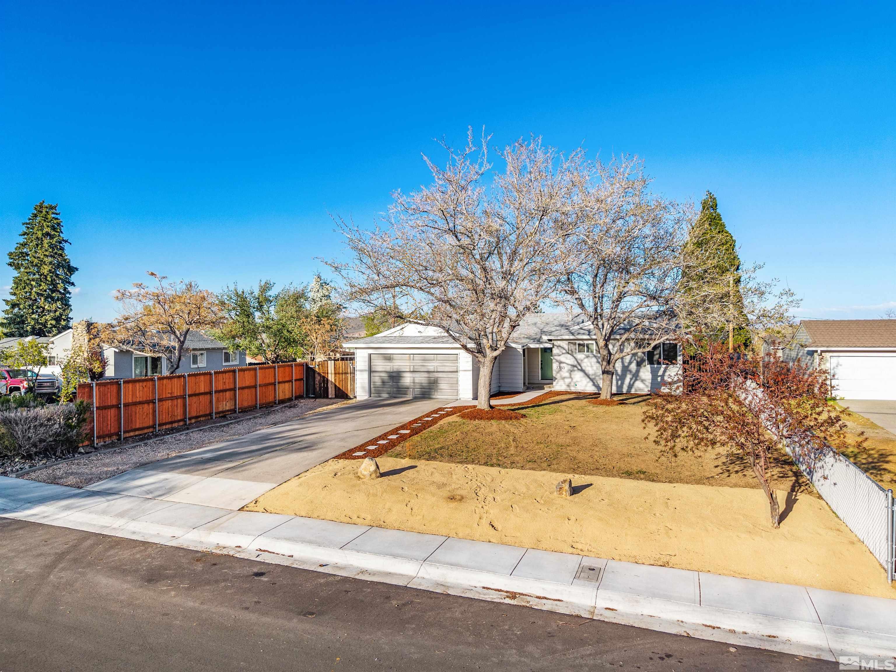 7750 Yorkshire Drive Reno, NV 89506 - Photo 33 of 33 a view of a yard of front a house