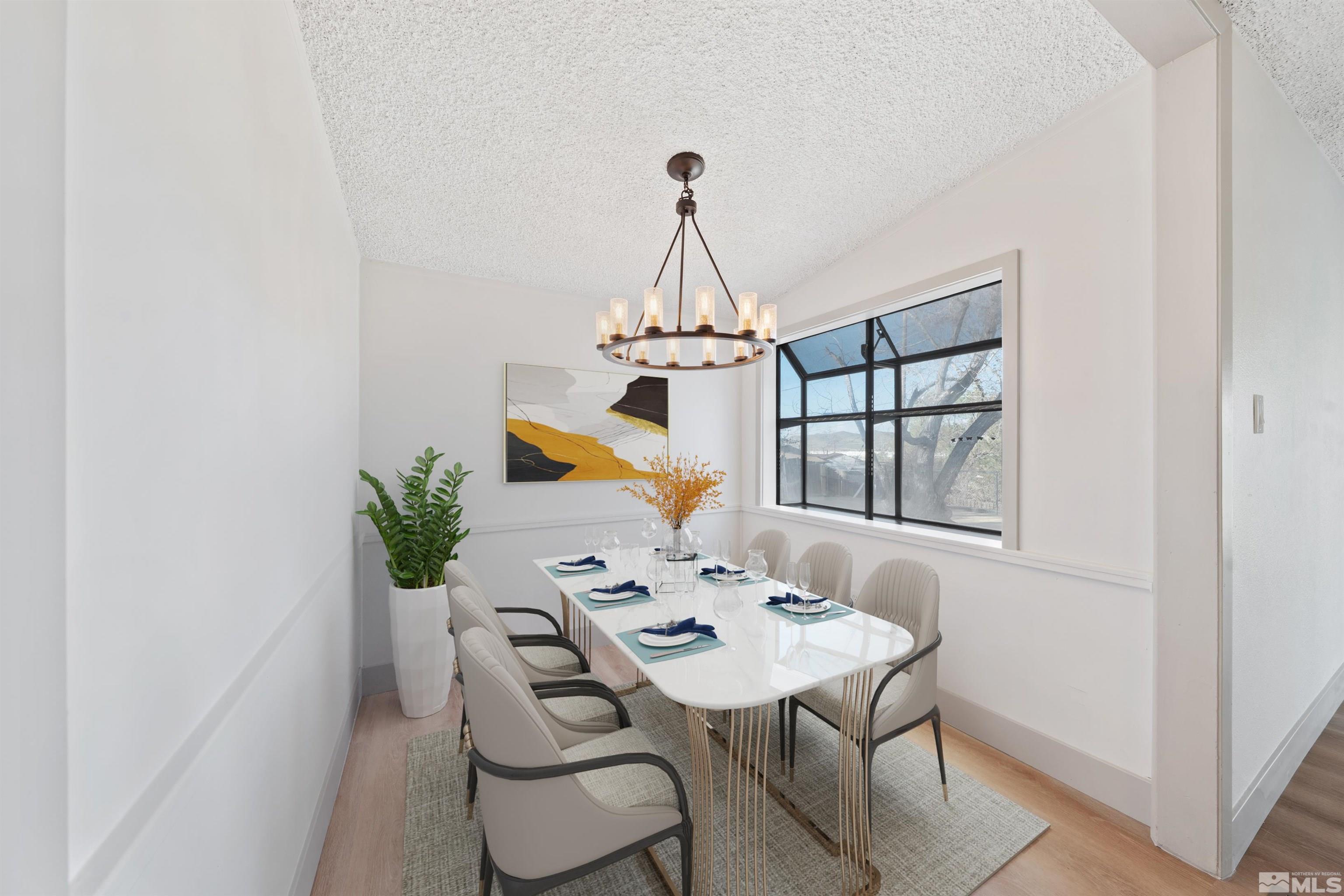 7750 Yorkshire Drive Reno, NV 89506 - Photo 6 of 33 a view of a dining room with furniture and window