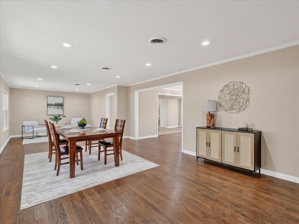 3863 Clayton Road East Fort Worth, TX 76116 - Photo 4 of 39 a view of a dining room with furniture and wooden floor