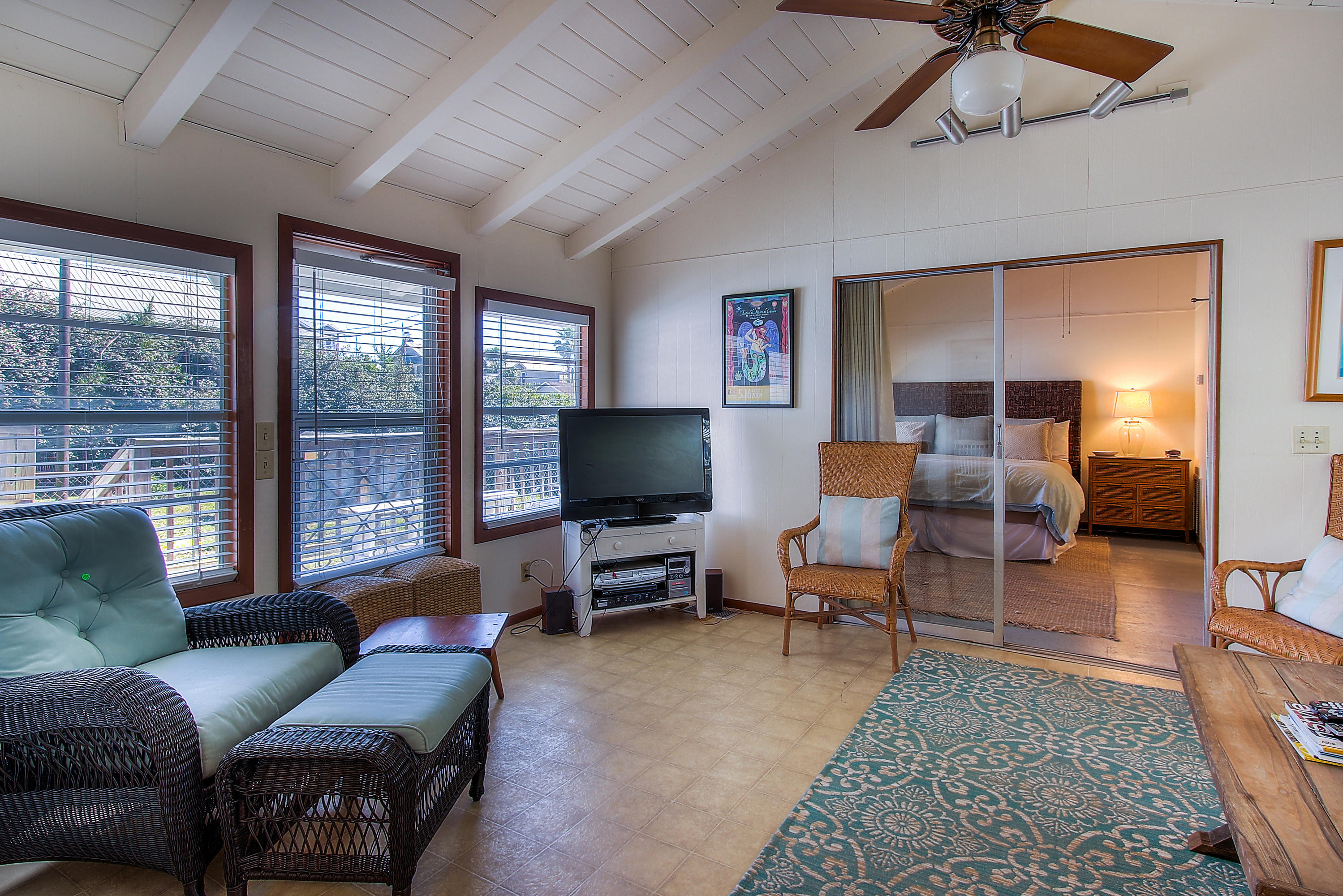 182 Garfield Street Santa Rosa Beach, FL 32459 - Photo 12 of 24 a living room with furniture and a flat screen tv