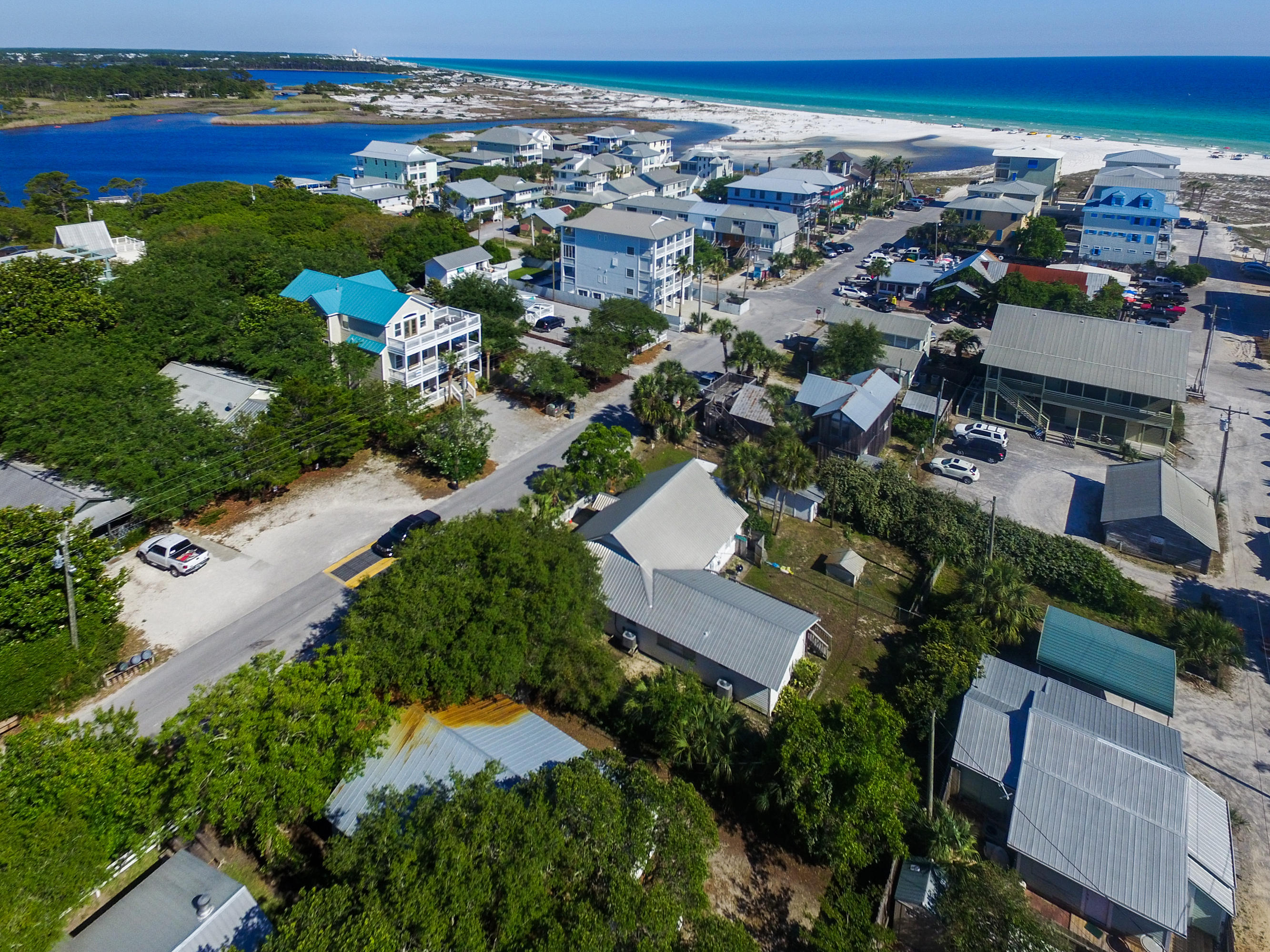 182 Garfield Street Santa Rosa Beach, FL 32459 - Photo 4 of 24 an aerial view of a city with lots of residential buildings ocean and mountain view in back