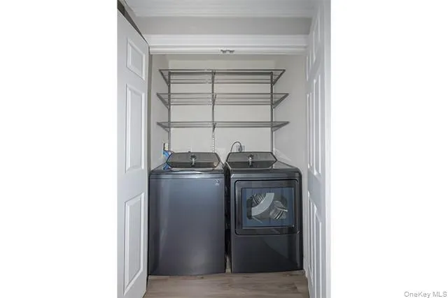 a utility room with washer and dryer