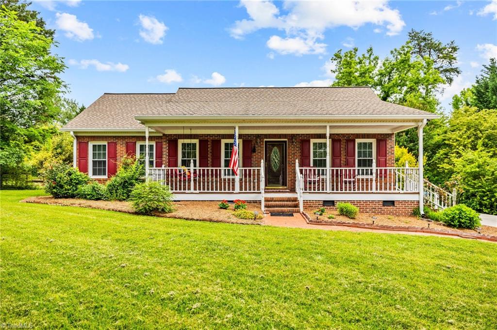3603 Fieldview Road Pleasant Garden, NC 27313 - Photo 1 of 31 Inviting covered front porch, a perfect spot to relax with a morning cup of coffee.