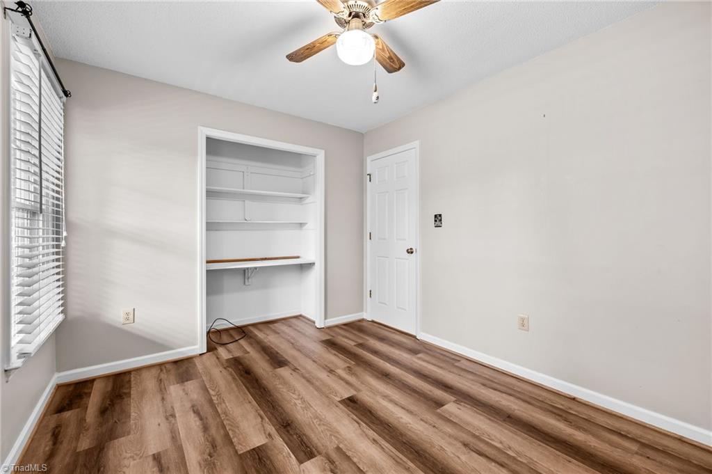 3603 Fieldview Road Pleasant Garden, NC 27313 - Photo 18 of 31 3rd bedroom has built in shelving in closet