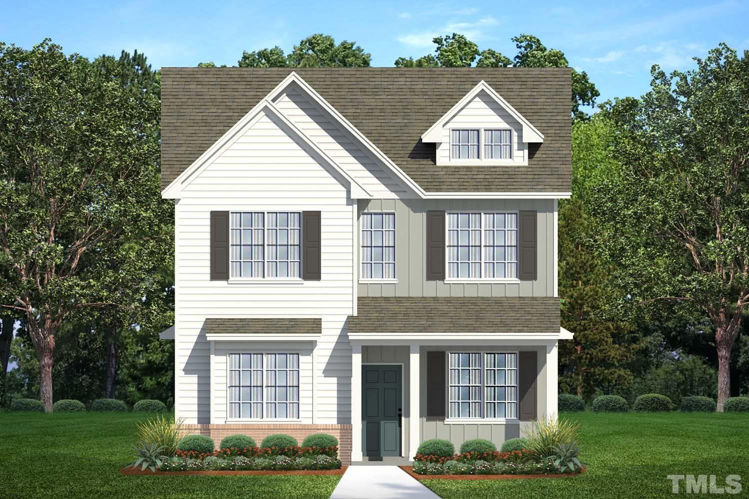 644 Ginger Mint Circle Knightdale, NC 27545 - Photo 1 of 23 front view of a house and a yard