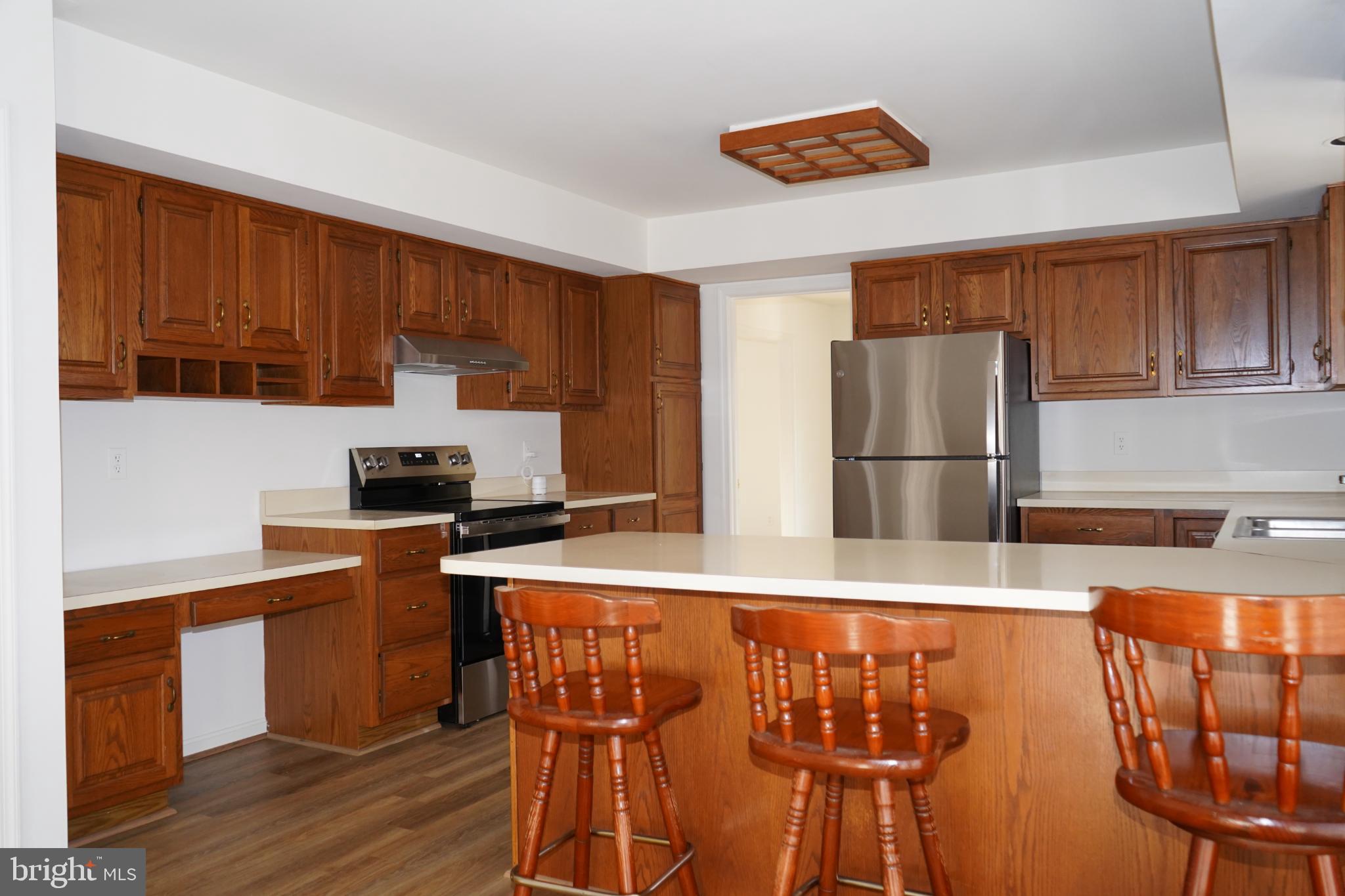 7323 O'Keefe Road Bealeton, VA 22712 - Photo 10 of 26 Spacious kitchen with warm wooden accents.