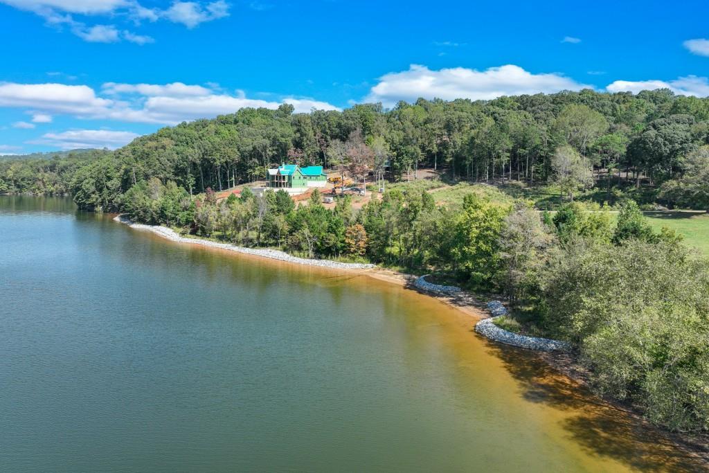 4596 Shirley Road Gainesville, GA 30506 - Photo 3 of 22 a view of a lake with a mountain