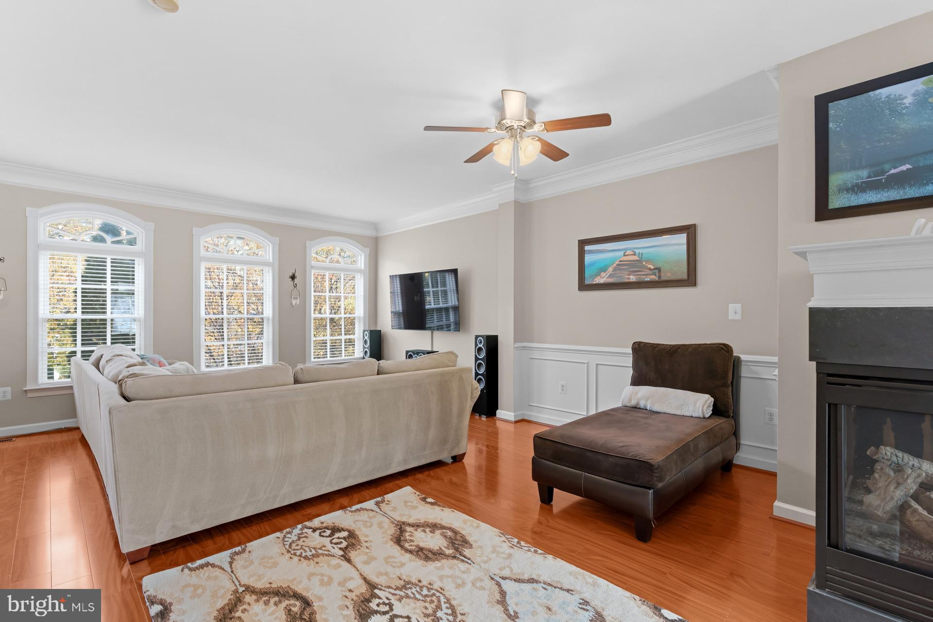 10423 Rifle Road Bristow, VA 20136 - Photo 13 of 39 a living room with furniture and a fireplace