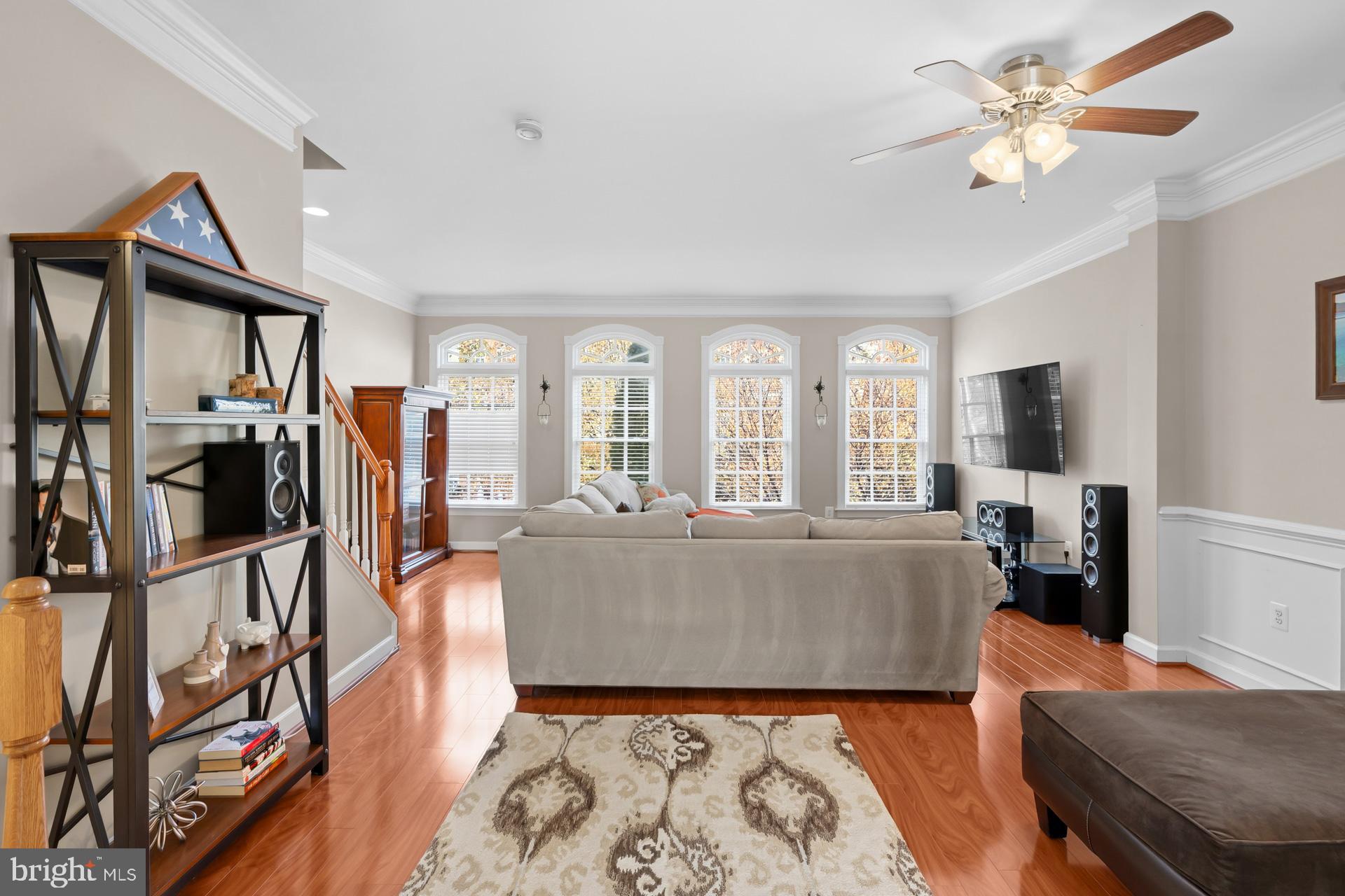 10423 Rifle Road Bristow, VA 20136 - Photo 14 of 39 a living room with furniture and a flat screen tv