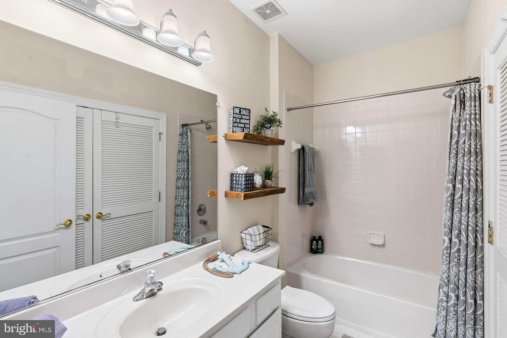 10423 Rifle Road Bristow, VA 20136 - Photo 21 of 39 a bathroom with a sink toilet tub and shower