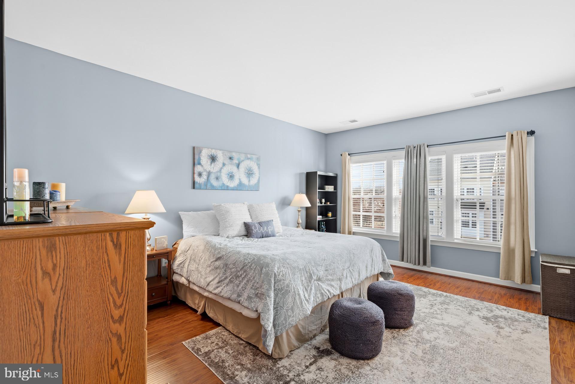 10423 Rifle Road Bristow, VA 20136 - Photo 23 of 39 a bedroom with a bed and glass door