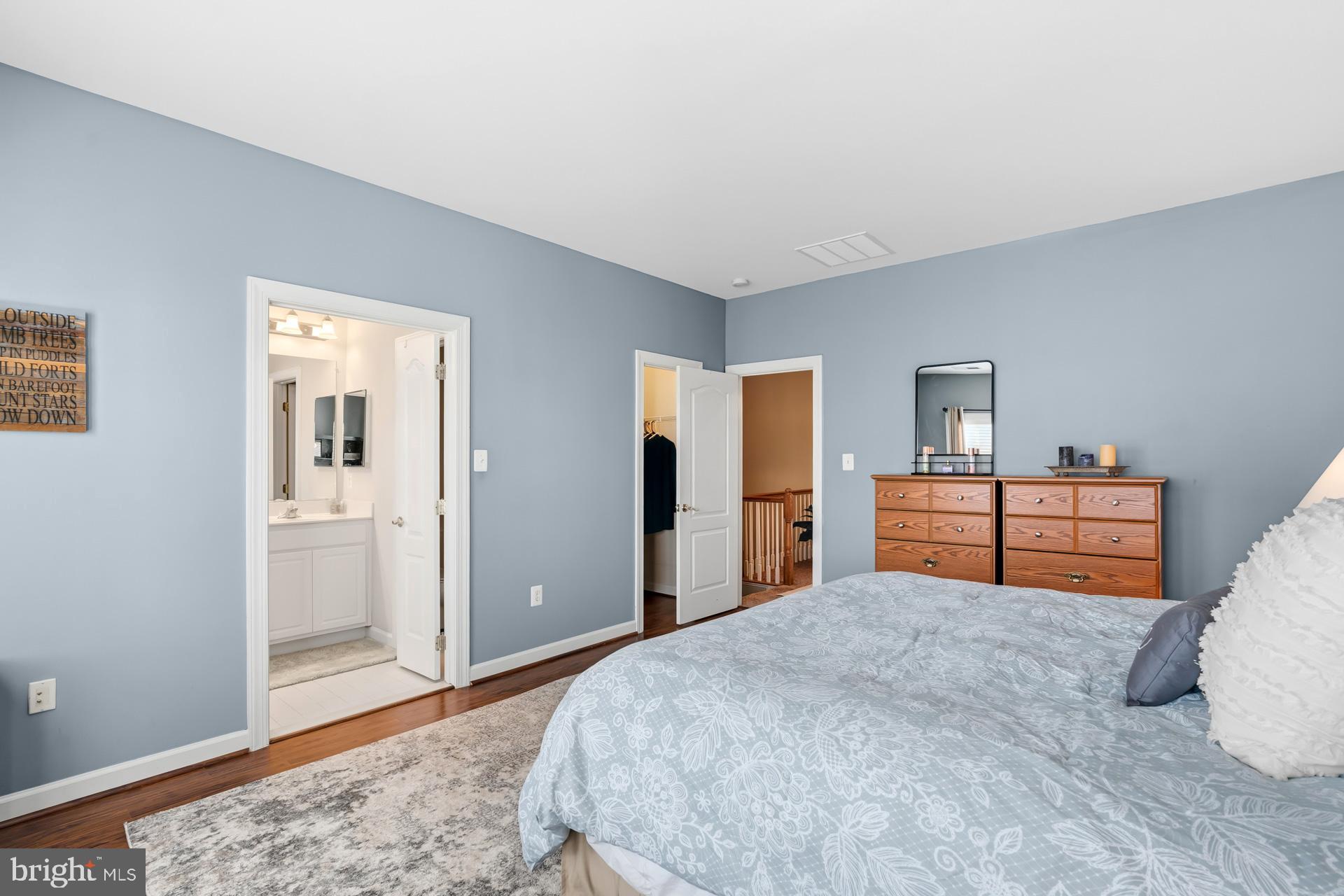 10423 Rifle Road Bristow, VA 20136 - Photo 25 of 39 a bed room with a bed and dresser