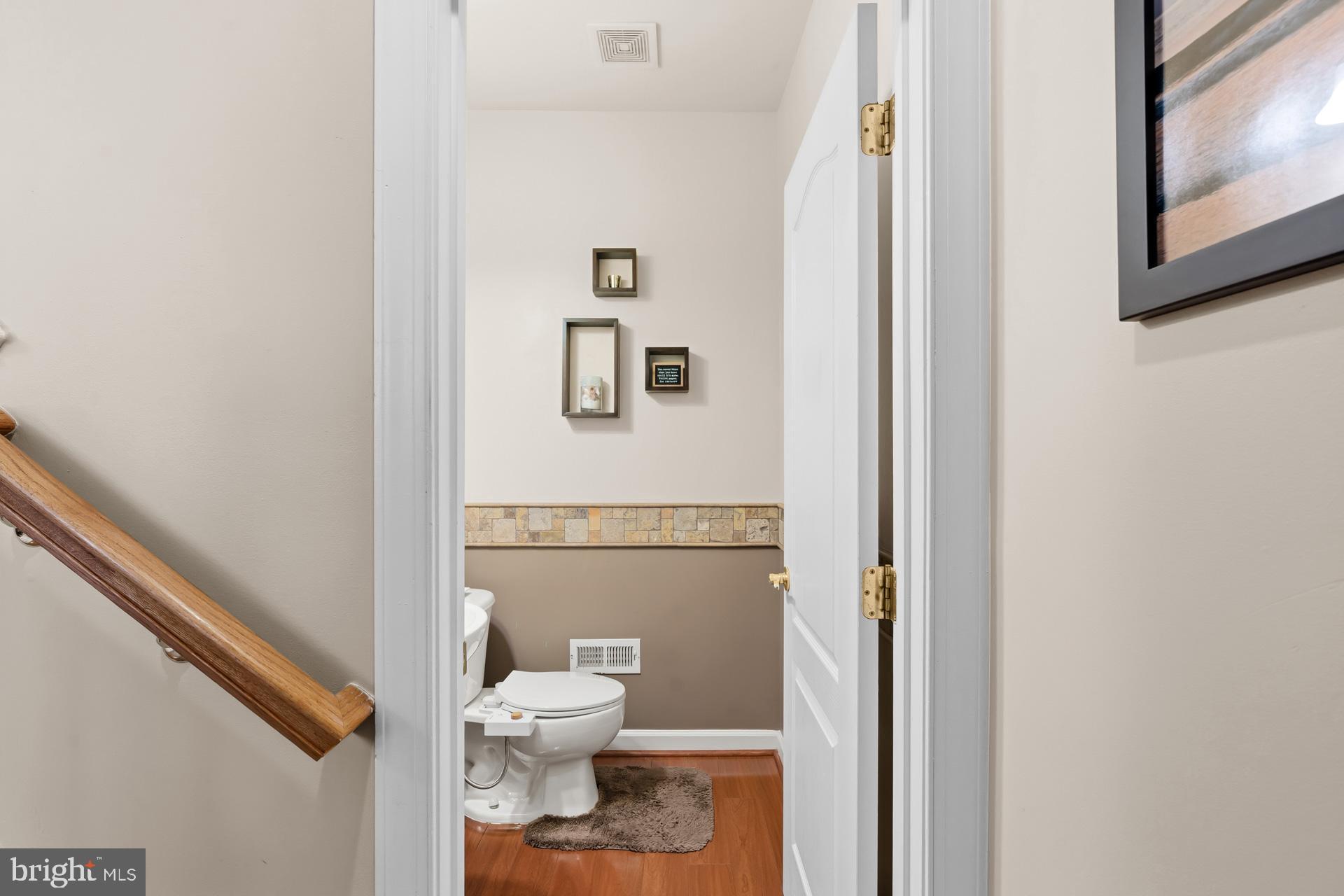 10423 Rifle Road Bristow, VA 20136 - Photo 7 of 39 a bathroom with a toilet