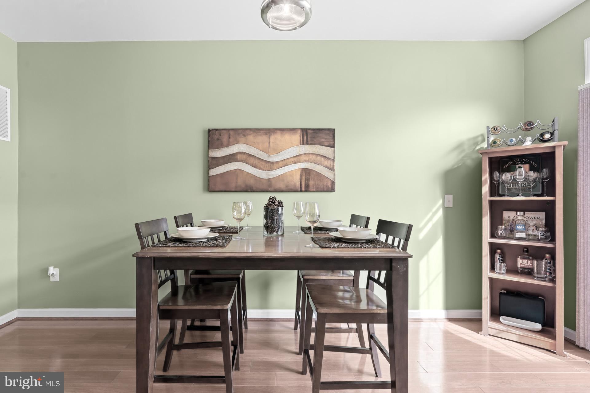 10423 Rifle Road Bristow, VA 20136 - Photo 8 of 39 a view of a dining room with furniture