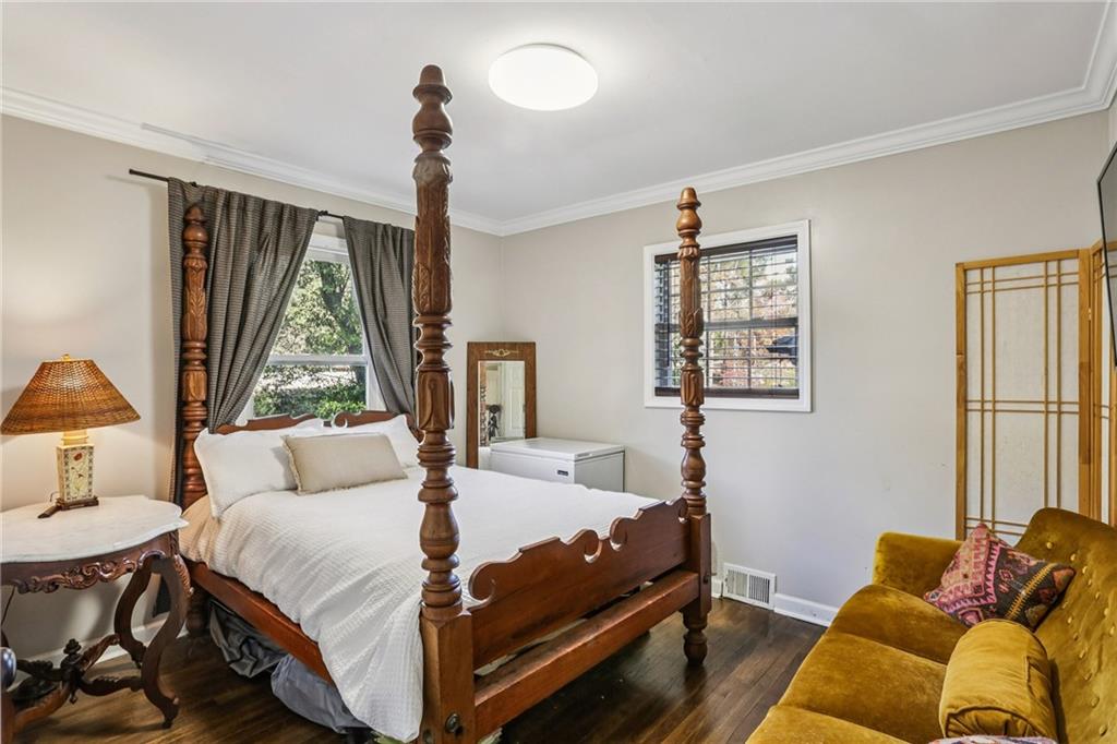 1609 Tanager Circle Decatur, GA 30032 - Photo 15 of 26 a bedroom with a bed and a window