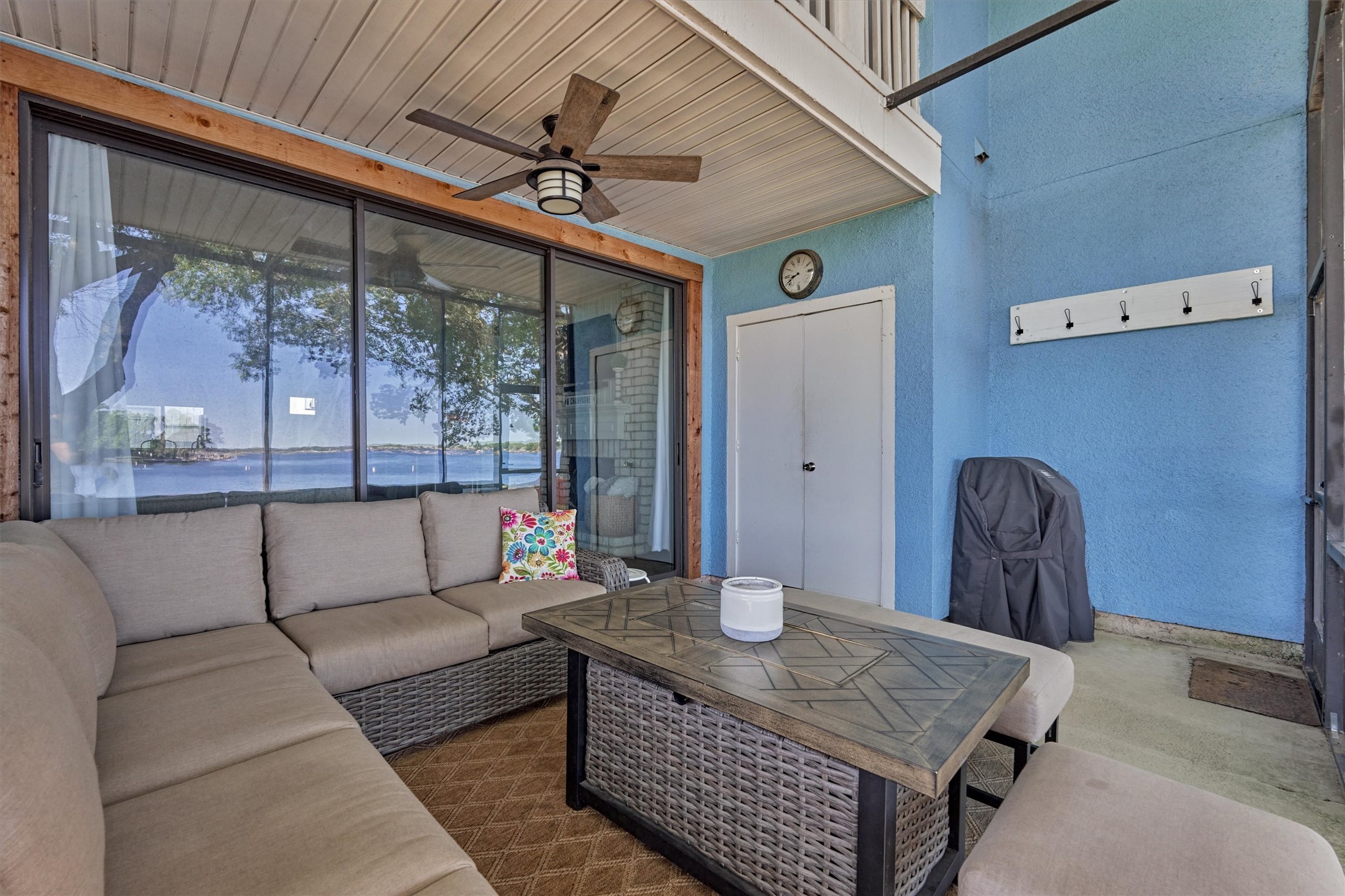 1428 Bowsprit Point Willis, TX 77318 - Photo 19 of 47 A two-story screened in porch protects the first floor and second floor balcony from unwanted bugs so you can enjoy the view anytime! A storage closet provides extra storage and convenient hooks hold towels and bathing suits after lakeside fun!