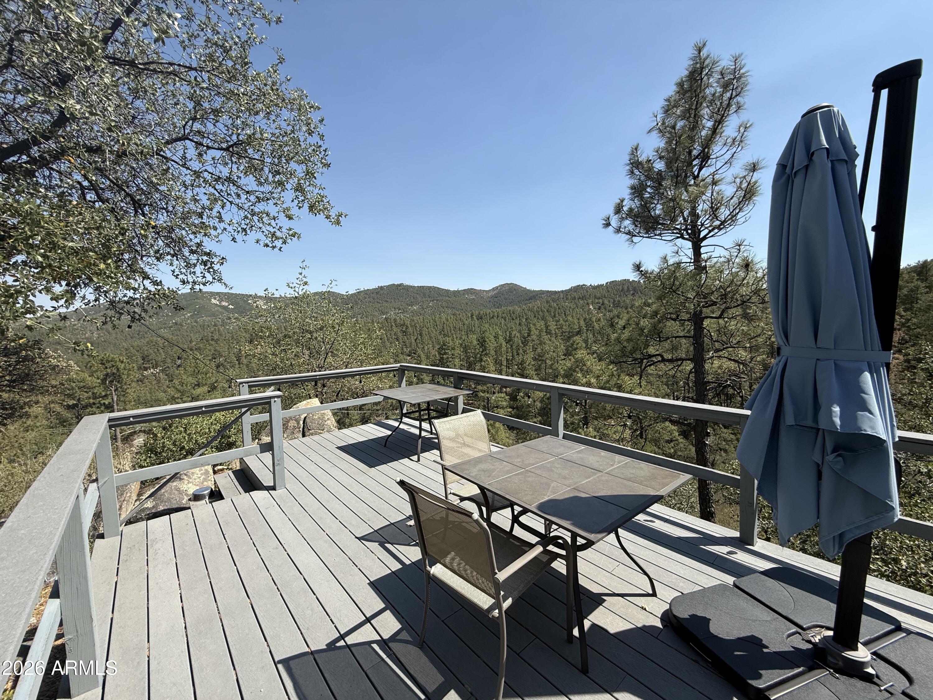 6687 Mountain View Road Crown King, AZ 86343 - Photo 3 of 18 a view of balcony with furniture