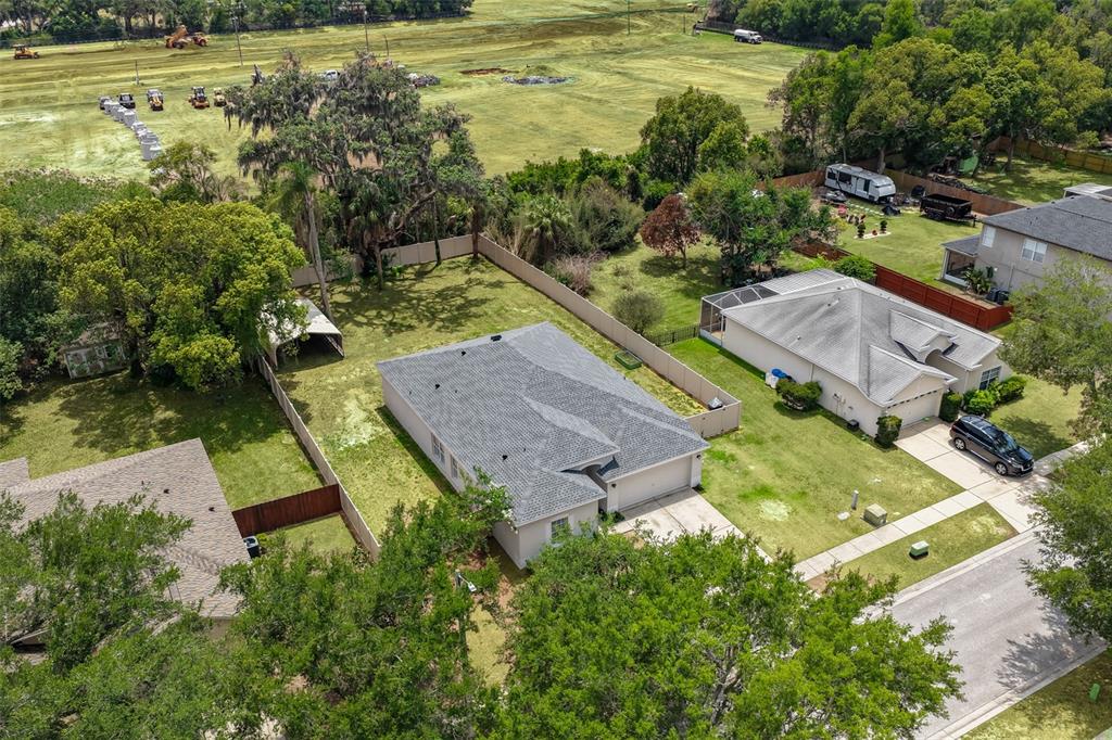 708 Coade Stone Drive Seffner, FL 33584 - Photo 2 of 48 an aerial view of residential houses with outdoor space and swimming pool