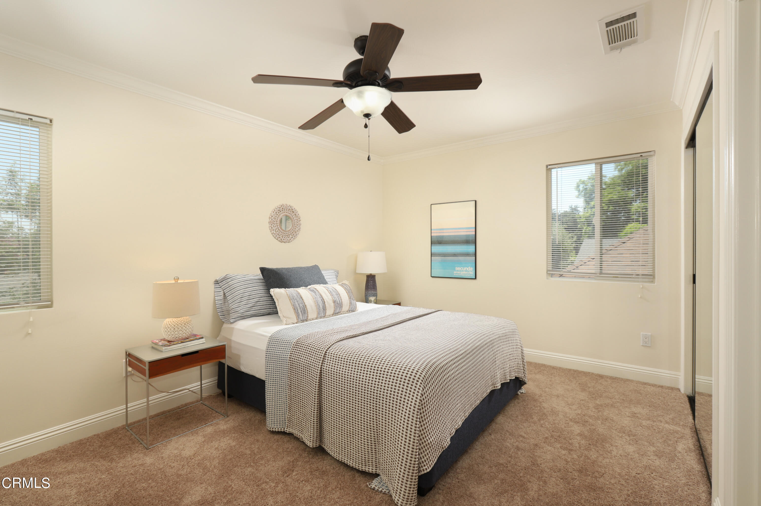 1062 Morada Place Altadena, CA 91001 - Photo 14 of 24 a bedroom with a bed and window