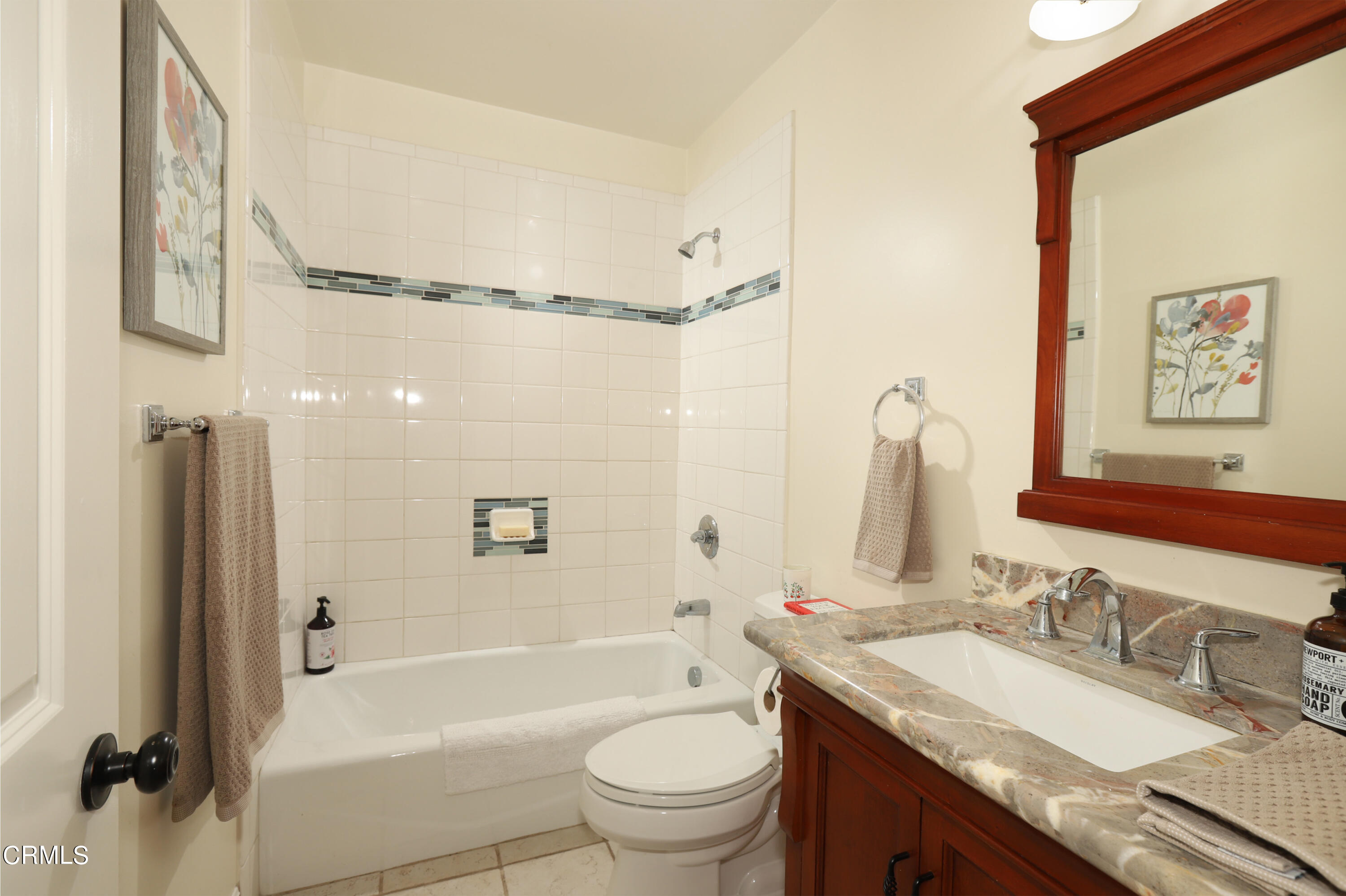 1062 Morada Place Altadena, CA 91001 - Photo 15 of 24 a bathroom with a granite countertop sink toilet and shower