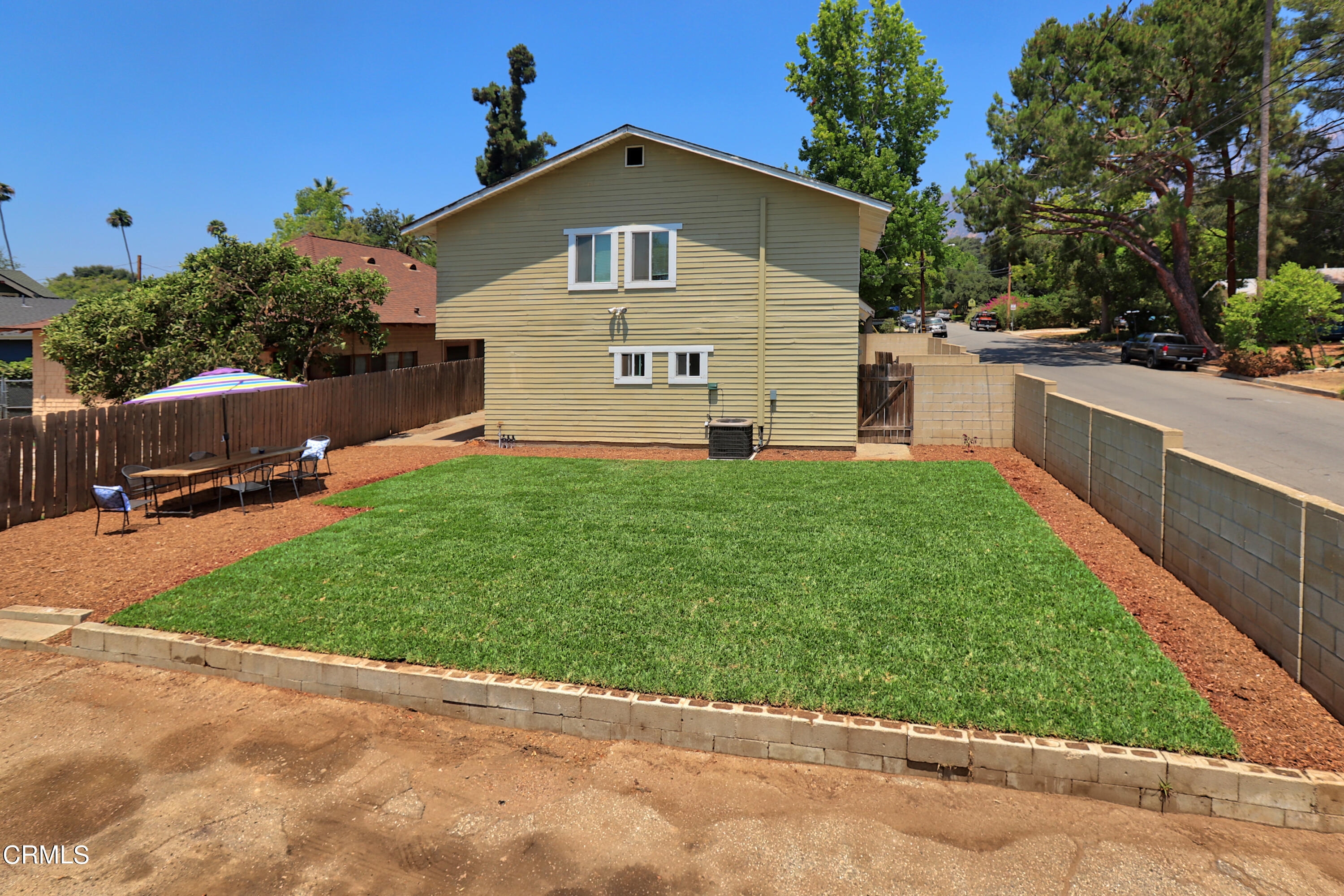 1062 Morada Place Altadena, CA 91001 - Photo 16 of 24 a front view of a house with a yard