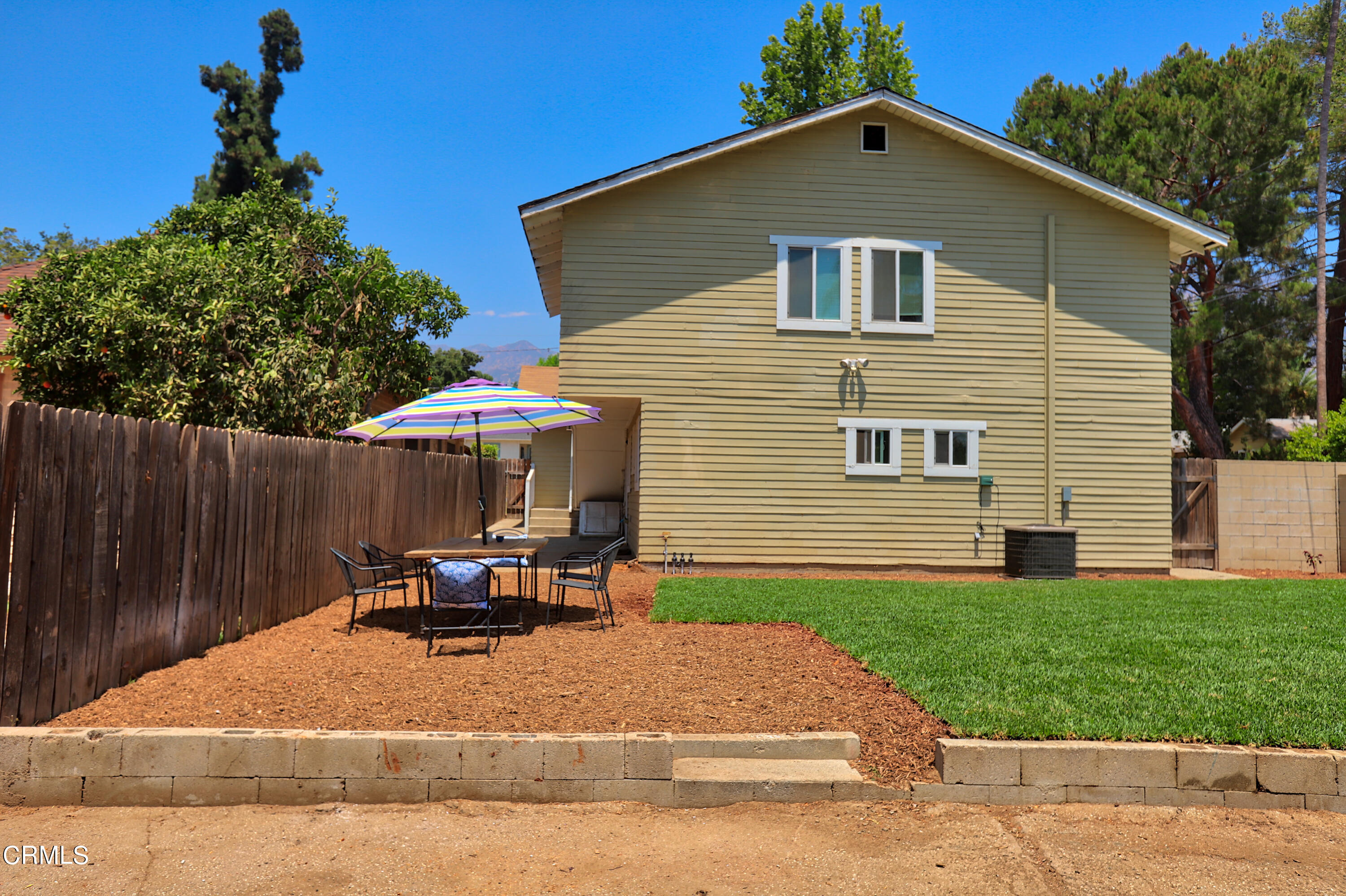 1062 Morada Place Altadena, CA 91001 - Photo 17 of 24 a backyard of a house with table and chairs