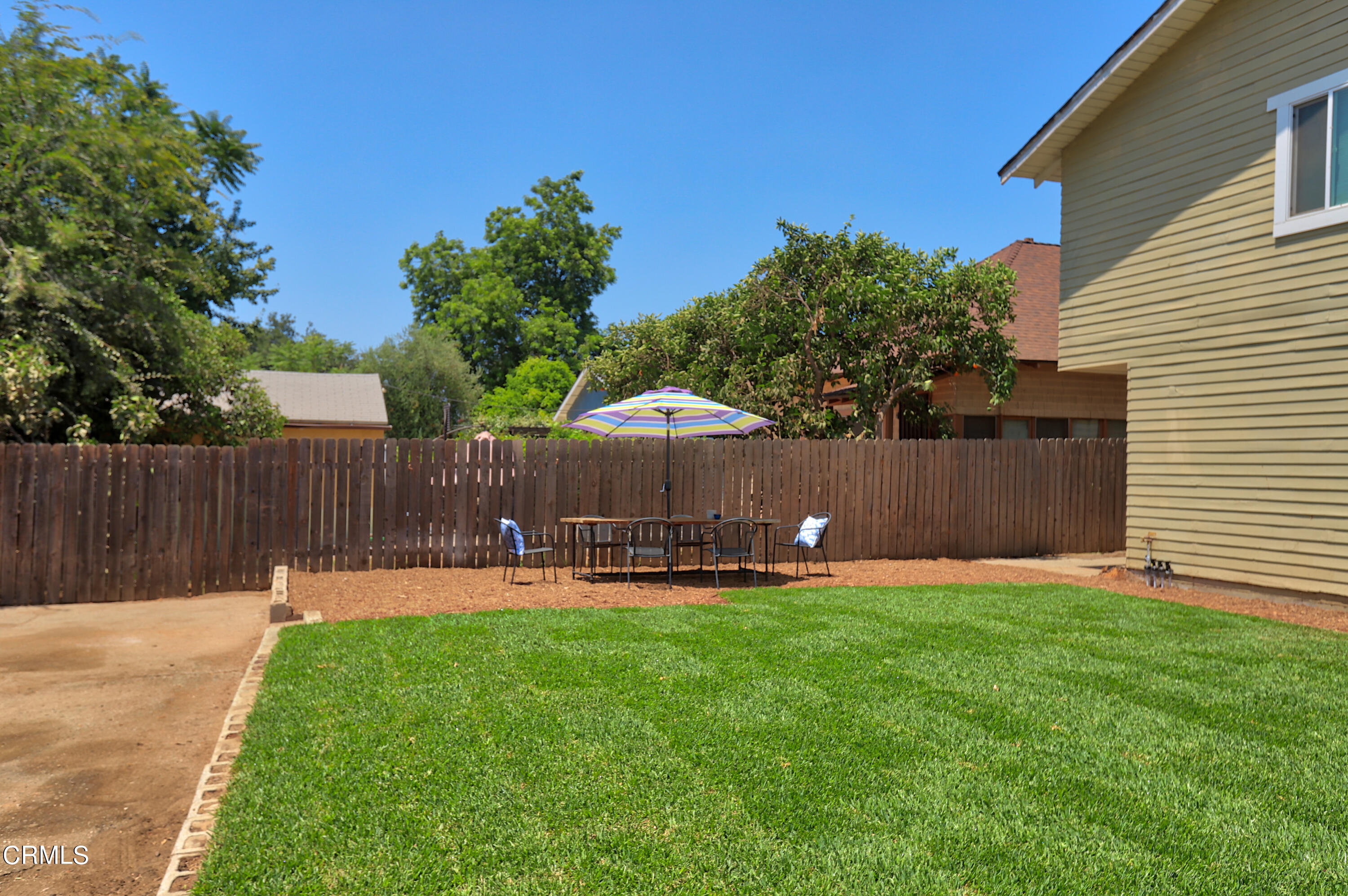 1062 Morada Place Altadena, CA 91001 - Photo 18 of 24 a backyard of a house with table and chairs