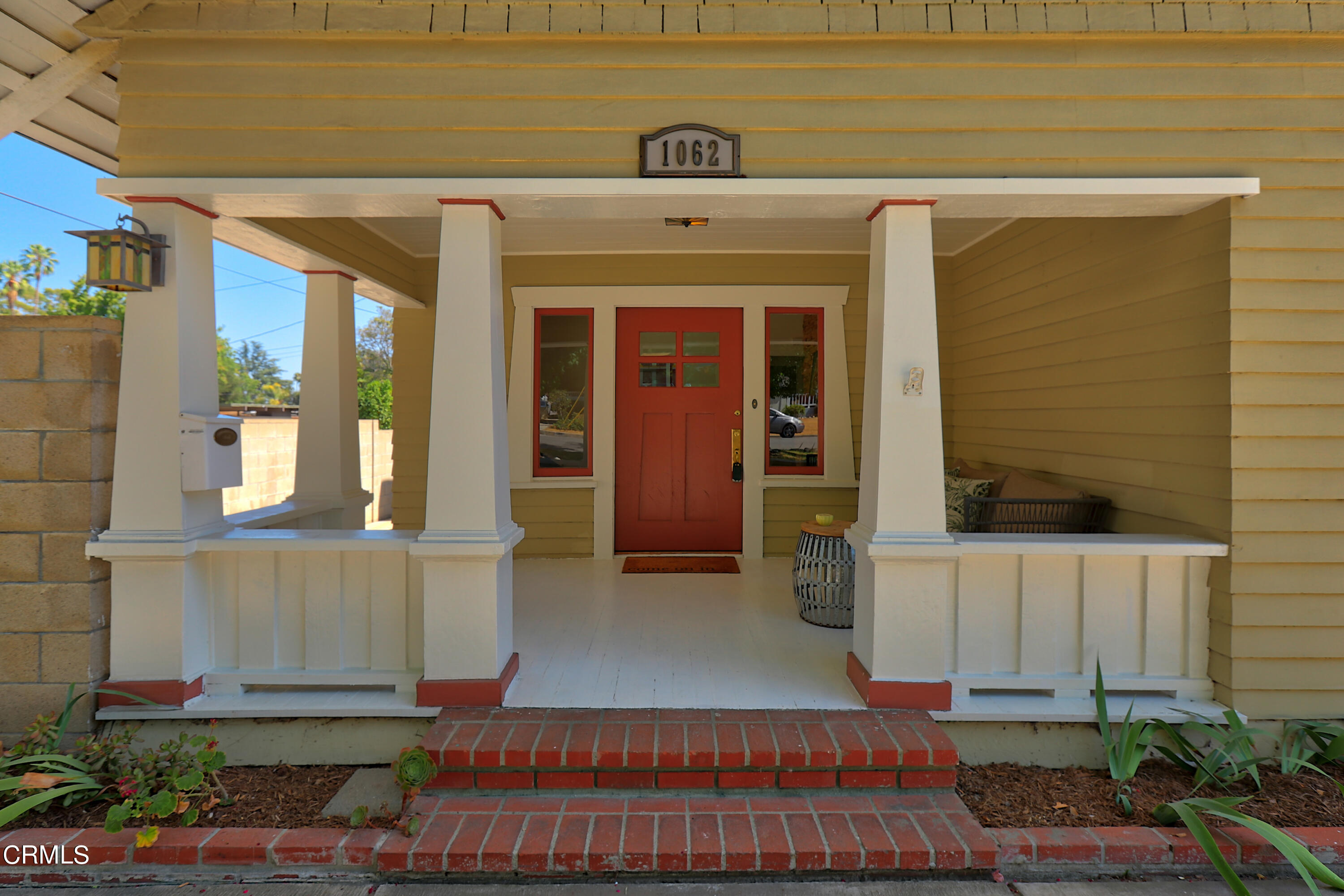 1062 Morada Place Altadena, CA 91001 - Photo 3 of 24 a front view of a house with a yard