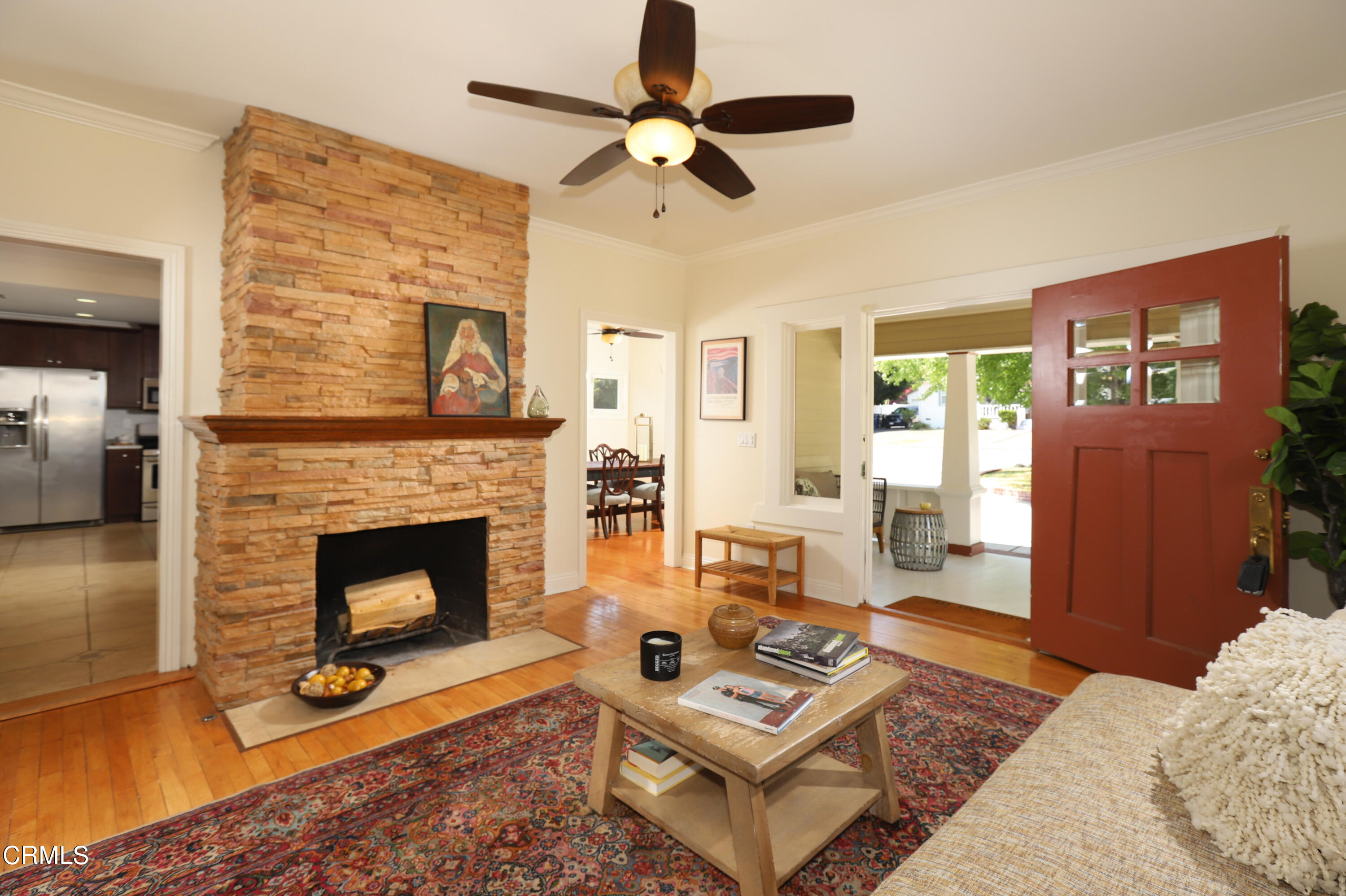 1062 Morada Place Altadena, CA 91001 - Photo 5 of 24 a living room with furniture a rug and a fireplace