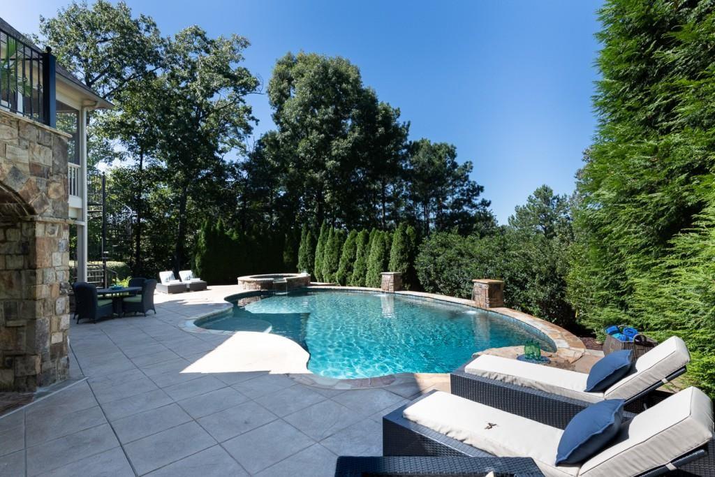 165 Autry Trail Alpharetta, GA 30022 - Photo 58 of 70 a view of a patio with swimming pool