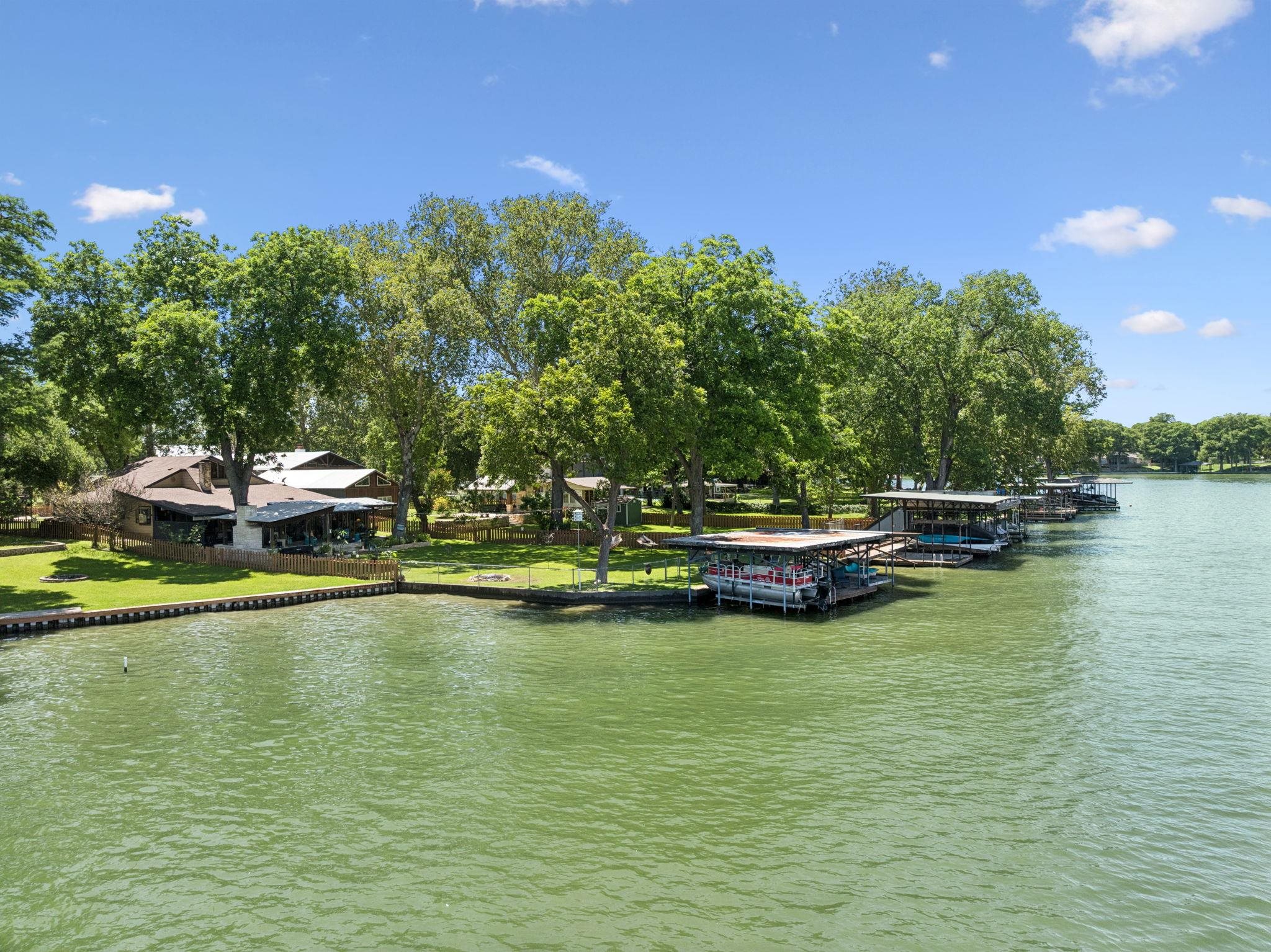 1435 East Zipp Road New Braunfels, TX 78130 - Photo 3 of 43 a view of a lake with houses