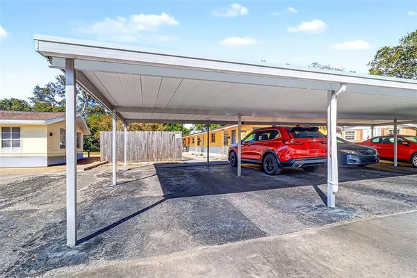 a view of a garage with a table and chairs