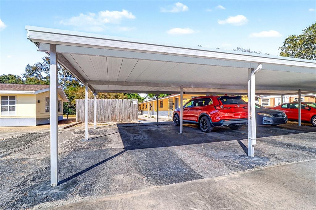 5441 Oceanic Road Holiday, FL 34690 - Photo 13 of 13 a view of a garage with a table and chairs