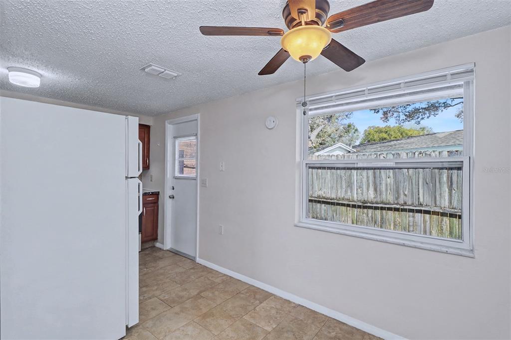5441 Oceanic Road Holiday, FL 34690 - Photo 5 of 13 wooden floor in an empty room with a window