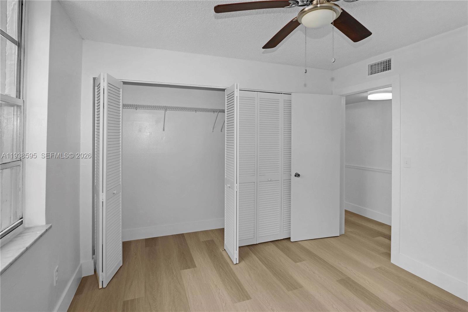 8309 Southwest 142nd Avenue, Unit G112 Miami, FL 33183 - Photo 18 of 28 a view of an empty room