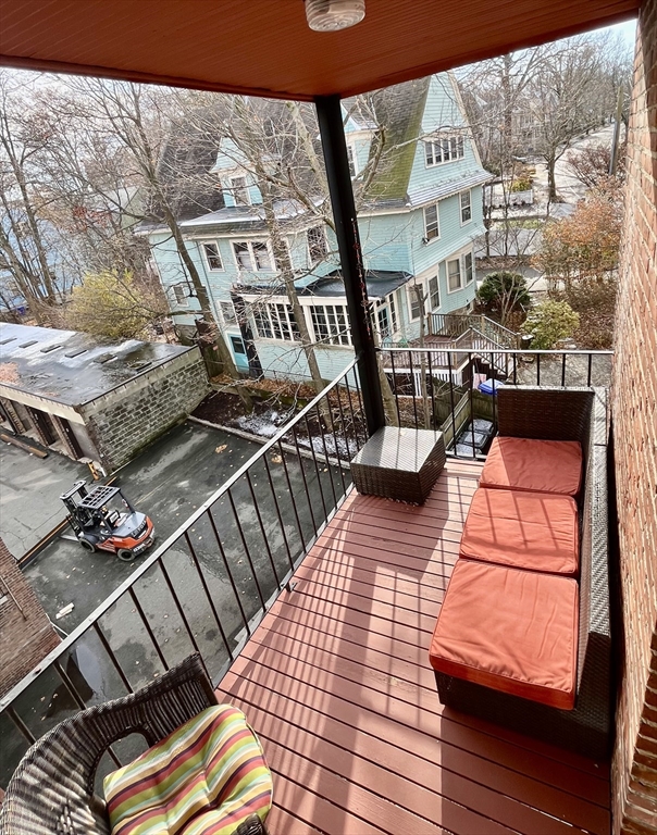 26 Gibbs Street, Unit 5 Brookline, MA 02446 - Photo 11 of 14 a view of balcony with furniture