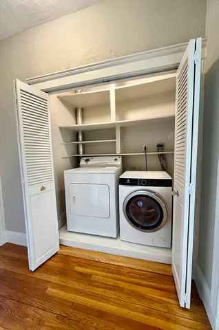 a utility room with washer and dryer