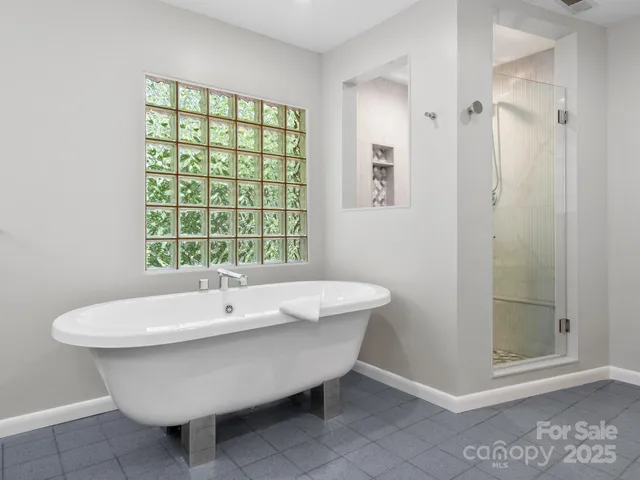 a bathroom with a sink and a bathtub