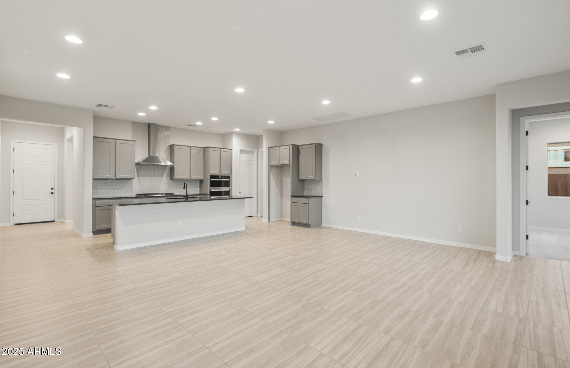 16158 West Red Bird Road Surprise, AZ 85387 - Photo 17 of 29 Gathering Room/Cafe/Kitchen