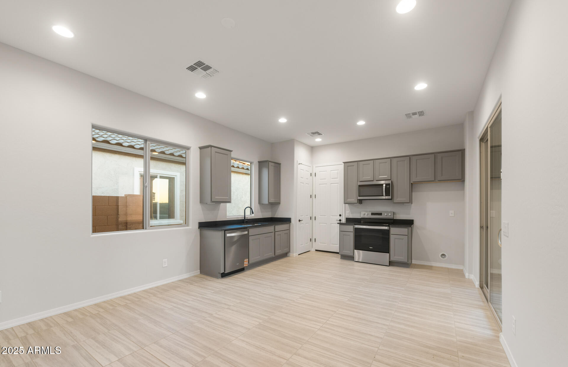 16158 West Red Bird Road Surprise, AZ 85387 - Photo 2 of 29 AllGen Living Room/Kitchen