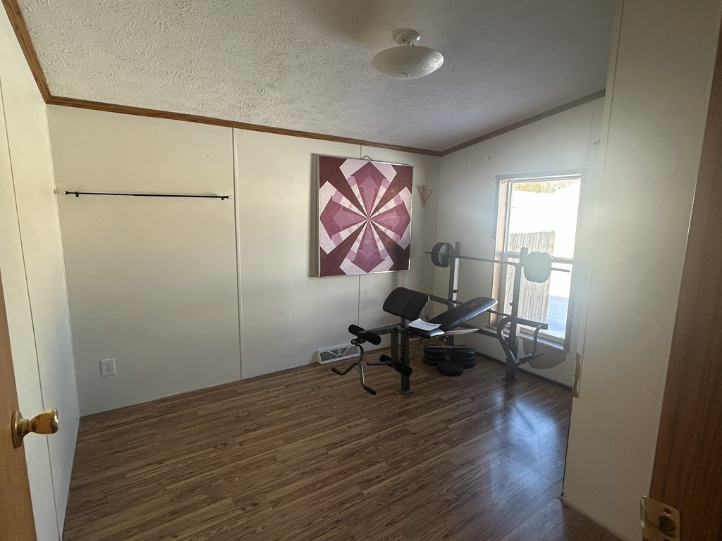 321 Ridge Avenue Avenue Strattanville, PA 16258 - Photo 12 of 29 a workspace with wooden floor