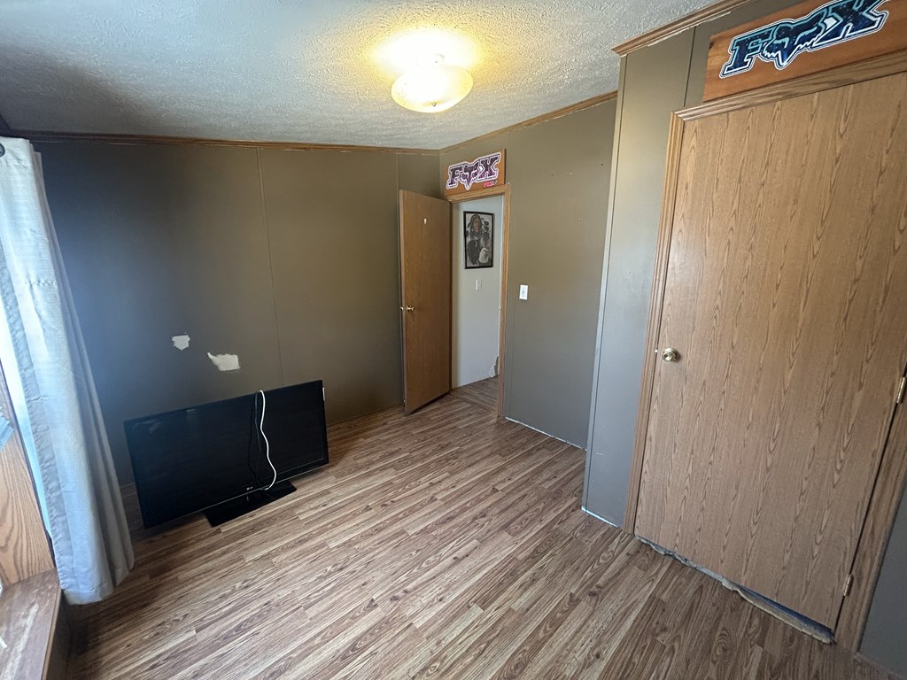 321 Ridge Avenue Avenue Strattanville, PA 16258 - Photo 15 of 29 a view of a hallway with wooden floor