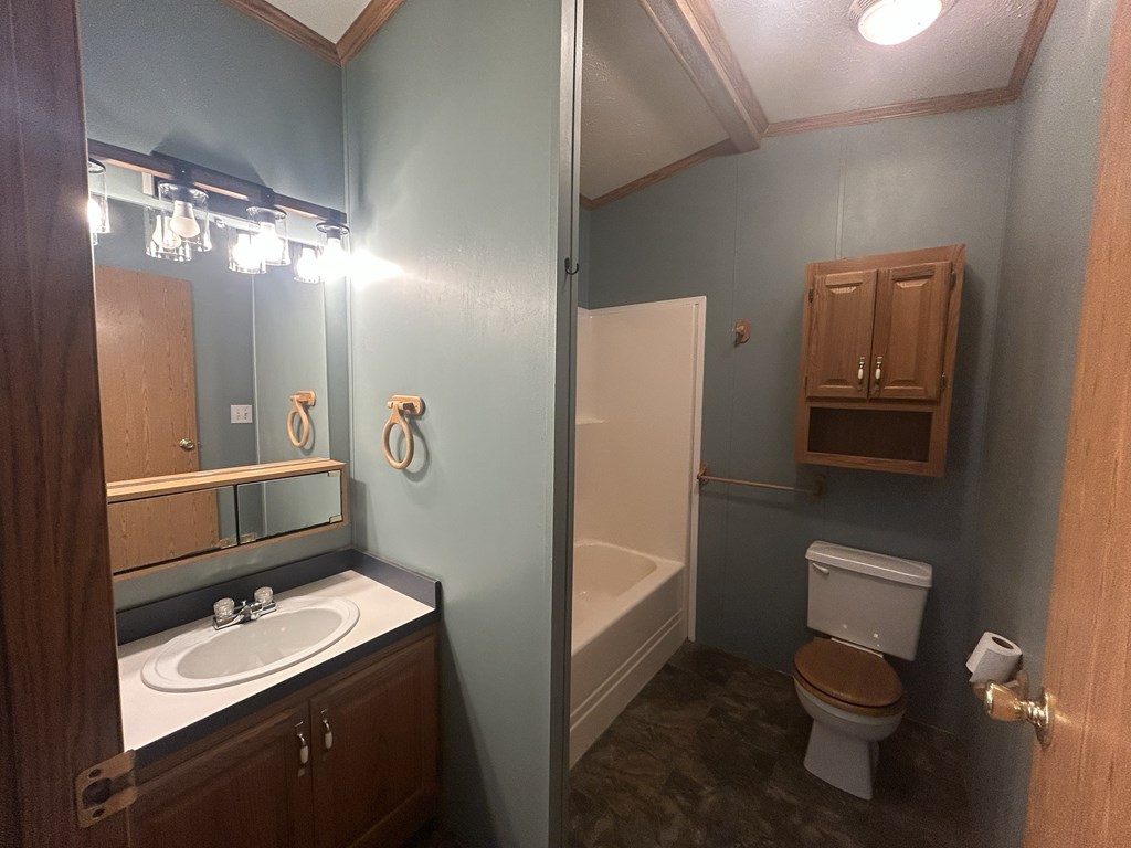 321 Ridge Avenue Avenue Strattanville, PA 16258 - Photo 16 of 29 a bathroom with a sink a toilet and shower