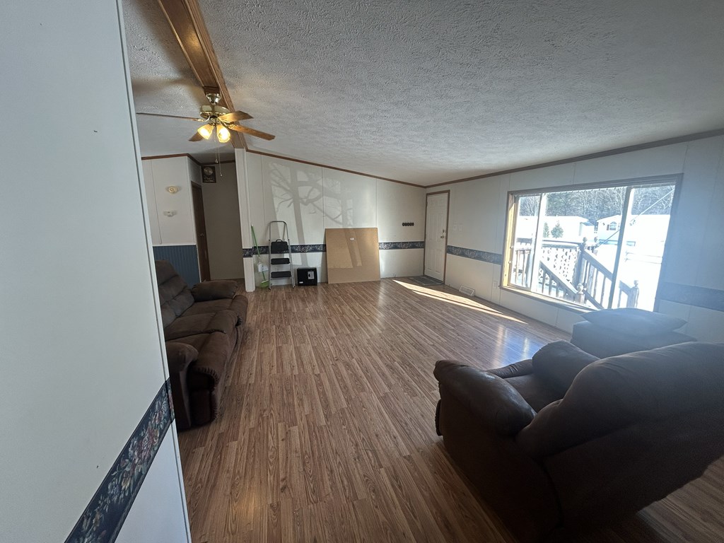 321 Ridge Avenue Avenue Strattanville, PA 16258 - Photo 17 of 29 a living room with furniture and a window