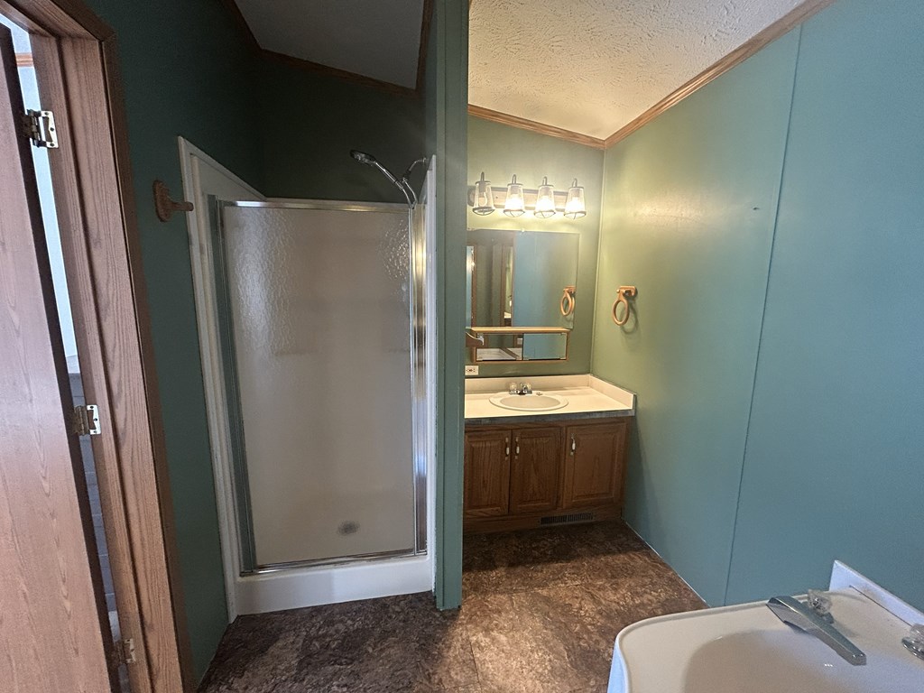 321 Ridge Avenue Avenue Strattanville, PA 16258 - Photo 22 of 29 a bathroom with a sink and mirror