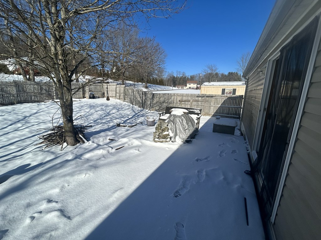 321 Ridge Avenue Avenue Strattanville, PA 16258 - Photo 26 of 29 a view of a backyard with wooden fence