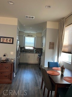 4235 Mission Ranch Way Oceanside, CA 92057 - Photo 5 of 16 Dining room to kitchen