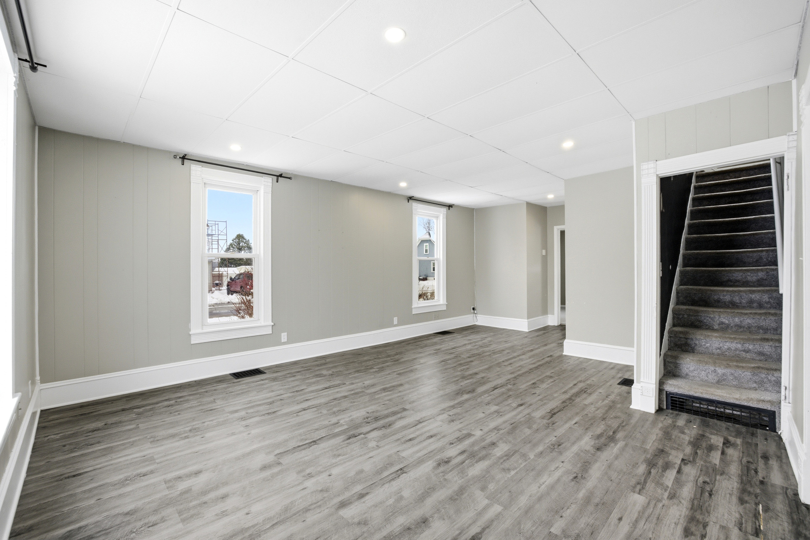 406 West Balsam Street Forreston, IL 61030 - Photo 15 of 36 an empty room with wooden floor closet and windows